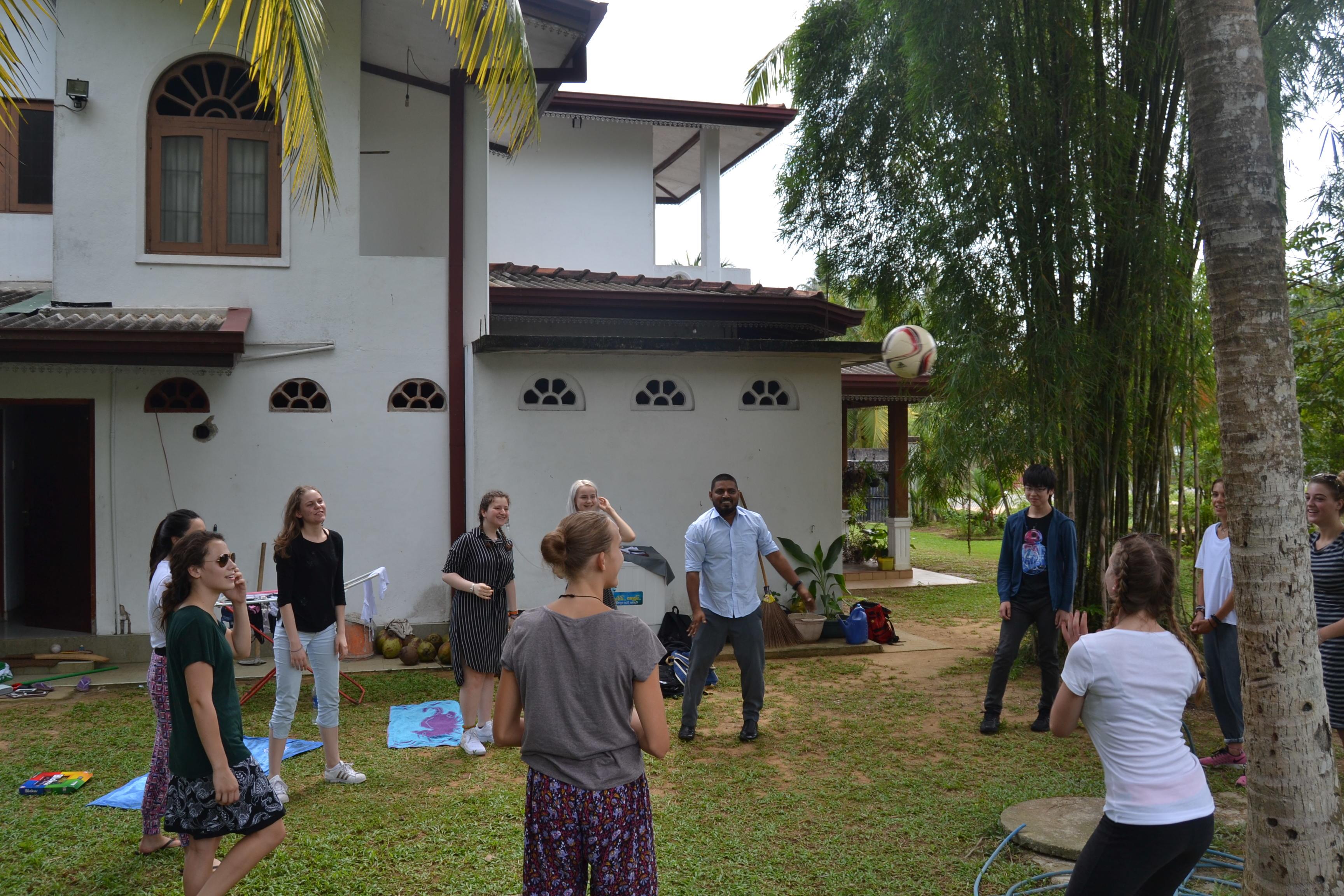 Projects Abroad volunteers practise throwing a ball for their sports coaching in schools in Sri Lanka Volunteers get valuable sports coaching work experience in Sri Lanka practising their ball skills